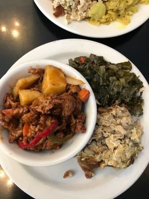 BBQ Ribs with Baked Mac and Cheese and Collard Greens at The Land of Kush in Baltimore