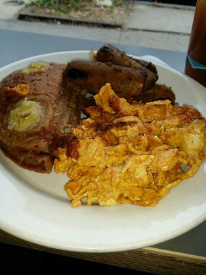 Banana pancakes, scramble, and sausage. at The Land of Kush in Baltimore