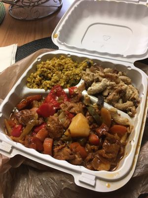 Kush BBQ wings, jollof rice, and mac & cheese at The Land of Kush in Baltimore