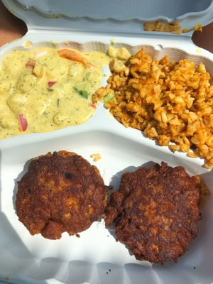 vegan crab cakes, potato salad, jollof rice at The Land of Kush in Baltimore