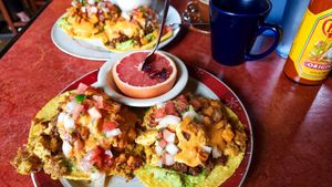 Special: Avocado Toastada w/ Orange Chipotle Gauc, Veggie Chorizo, & Tofu Scramble. Side of Grapefruit at Bouldin Creek Cafe in Austin