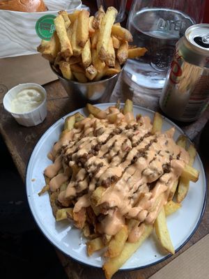 Vegan brisket loaded chips & a normal side of fries  at Patty & Bun in Brighton
