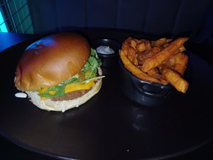 Guakame burger and sweet potato fries at Guakame Street Food in Valencia