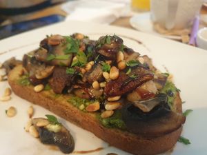 Tostada de champiñones y pesto at Nudie Foodie in Athens