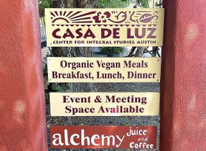 Sign out front   at Casa de Luz in Austin