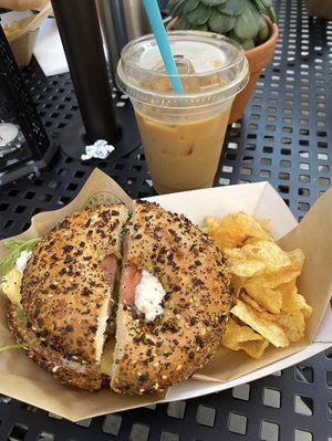 vegan sunrise with the scallion cream cheese. oat milk with coffee too!!  at Eola General in Orlando