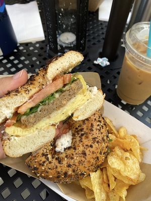 vegan sunrise with the scallion cream cheese. oat milk with coffee too!!  at Eola General in Orlando