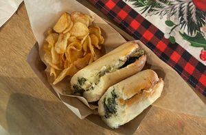 Artichoke and broccolini sandwich with chips  at Eola General in Orlando