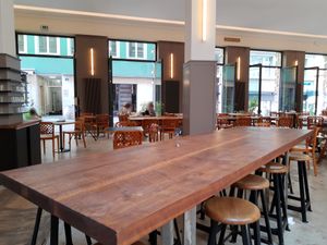 Indoor seating at "Unternehmen Mitte", same company at Gelato Vegano in Basel