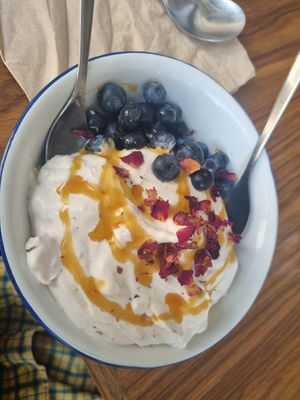 Weekly treat (blueberries with rose cream and petals). Yummmm at Venn Canteen in Porto