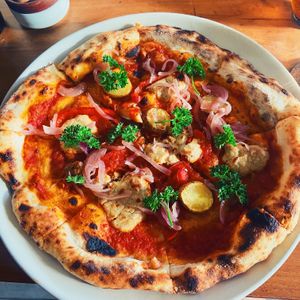Build your own with potato, bell pepper and caramelised onions  at Pizza Cult in Ubud