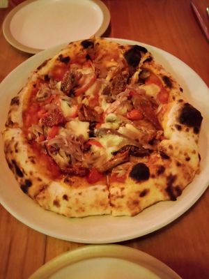 Pizza, not that impressed alot of dough not a huge amount of toppings or cheese at Pizza Cult in Ubud