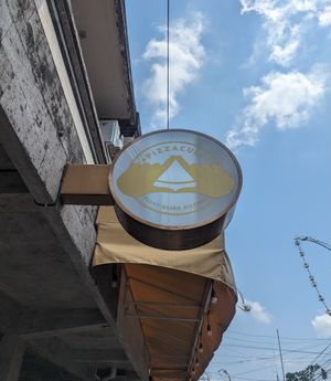 Entrance sign at Pizza Cult in Ubud
