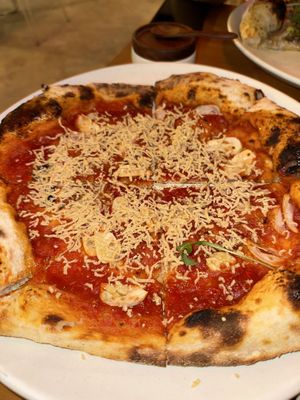 The ritual  at Pizza Cult in Ubud