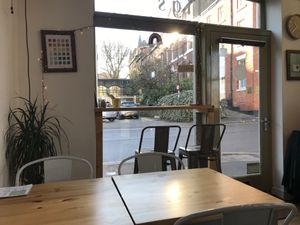 Window seats as well as standard tables and chairs  at Tigs Bagel & Coffee House in Sheffield