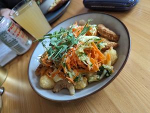 Tater tots loaded with faux chicken & Korean veg at Tigs Bagel & Coffee House in Sheffield
