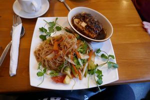Silken tofu in black bean sauce. Very tangy. With noodles and salad. at Pumpernickel Coffee Shop in Dumfries