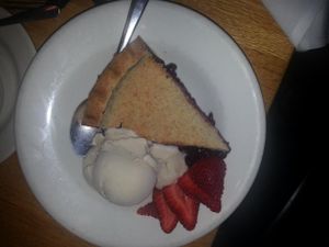 Blueberry Pie, vegan ice cream and organic strawberry garnish.  DELICIOUS.
 at Mother's Cafe and Garden in Austin