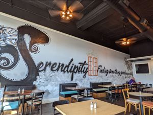Huge mural in the dining room section. at Serendipity at the Orange Door in Somerset