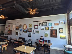 Art & other decor on the opposite wall. at Serendipity at the Orange Door in Somerset