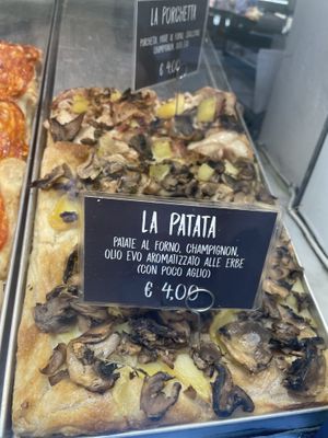Pizza with potatoes and mushrooms and garlic olive oil at La Cranceria in Florence