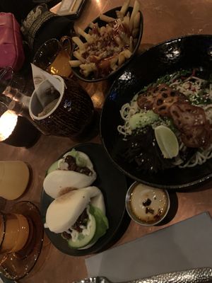 Loaded fries, noodle salad, fried mushrooms and fake duck buns  at The Alchemist in Salford