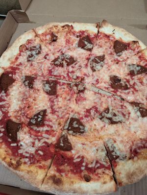 Pepperoni pizza with follow your heart cheese at Sizzle Pie - E Burnside in Portland