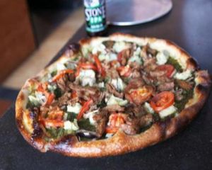 new maps out of hell: creamy basil cashew spread, seasoned soy curls, and choice of 3 veggies at Sizzle Pie - E Burnside in Portland