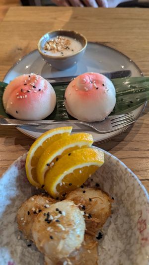 Dessert: BAO bun with red bean filling, coconut balls at Udum in Cologne