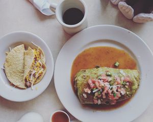 Breakfast burrito, tacos at Mr. Natural - East Cesar in Austin
