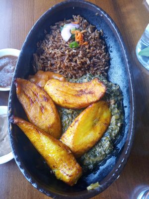 Mboga - Creamed spinach, stewed yellow beans, spiced rice pilaf, and plantains. at Baobab Fare in Detroit