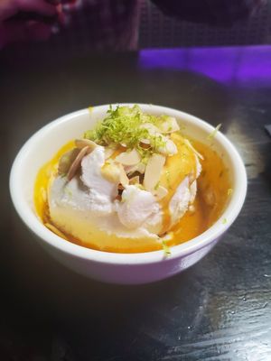 Coconut ice cream with mango puree at Takoi in Detroit