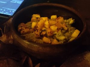 Guac with grilled pineapple pieces at Luvina Vegan Bar in Mexico City
