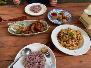 We ordered deep-fried Chicken Cake, crispy pork slices with spicy seafood dipping, sweet and sour tamarind stir fry and papaya salad    at Loving Hut - Pak Chong in Pak Chong