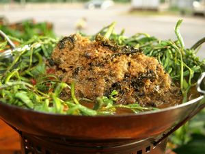 Water mimosa and deep fried wheat protein in tamarind flavor soup at Loving Hut - Pak Chong in Pak Chong