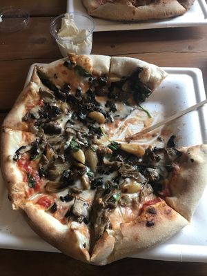 Pizza al fungi with mozzarella swapped for vegan cheese, and vegan garlic mayo on the side.   at Grain in Haverfordwest