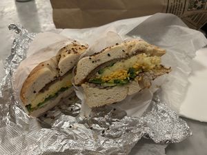 Onion bagel with vegan egg, vegan sausage, vegan cheese, onion and jalapeños.   at Court Street Bagels in Brooklyn