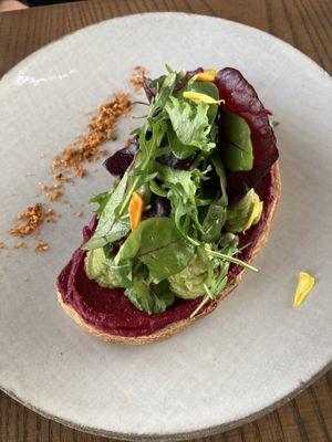 Avocado on sourdough  at Thalatheen  in Doha