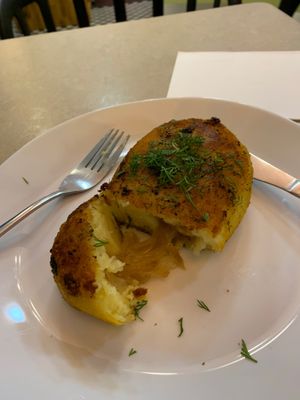 I do not recall the name for this yummy mashed potato stuffed with sour cabbage.  at Zloty Osiol in Katowice