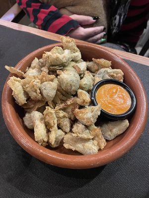 Carxofes arrebossades amb salsa romesco (demanar sense pernil)  at Granja el Melindro in Cardedeu