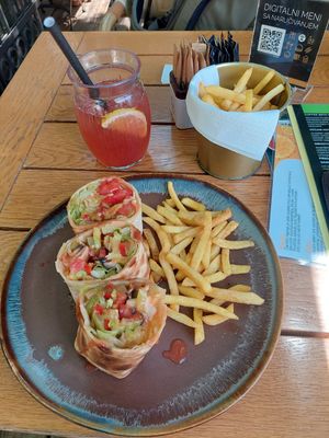 Veggie wrap 6.5 Euros plus additional french fries 1.80 Euros plus strawberry ice tea 3 Euros at Pekara in Niksic
