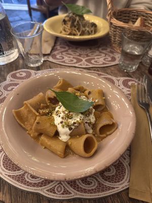 Pasta with tomato sauce and cheese, tagliatelle with mushrooms  at Orto con Cucina in Milan