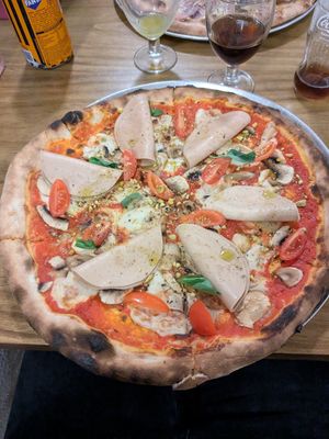 With vegan mortadella at A GoGò Pizzabar in Mallorca