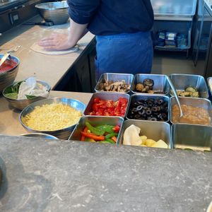 Making our pizza in front of us  at 800 Degrees in Yokohama