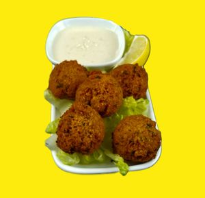 Falafel with classic Tahini sauce at Theano Vegan Greek & Mediterranean in Austin