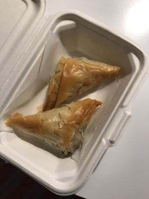 Spanakopitas !!! Sooooo flaky, I loooove. A little salty tho 😝 such a great texture  at Theano Vegan Greek & Mediterranean in Austin