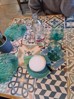 Café con leche and 💧 at The Club in Cordoba