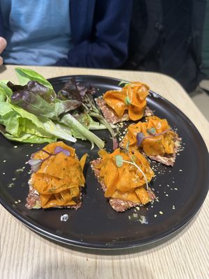 Smoked carrots with cream cheez on seed crackers  So lovely! 🤤  at Root Vegan - 本原純素 in Hong Kong Island