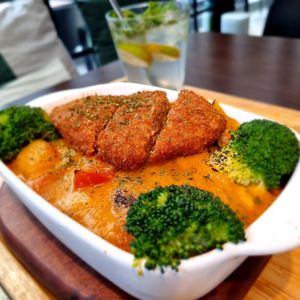 Hong kong style  baked pork chop rice mushroo. Tomato onion and broccoli at Root Vegan - 本原純素 in Hong Kong Island