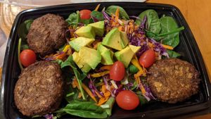 Three of the four crab cakes. The avocado was so fresh. at Natuurlik in Boynton Beach